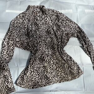 Kim Rogers Black and cream turtle neck top